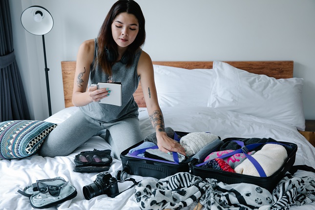 Girl packing items