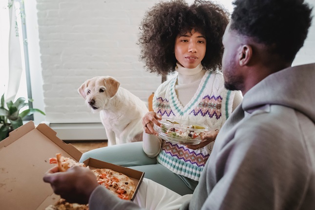 Woman Introducing Pet to Man